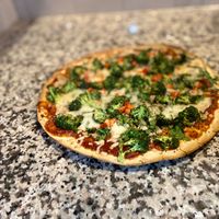 Gallery Photo of Your meals could include pizza if you work with me. 