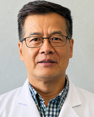Photo of Julian Zhu, Acupuncturist, L.Ac.,, O.M.