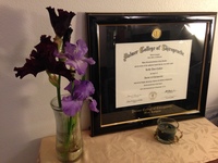 Gallery Photo of My favorite flower and my Chiropractic School Diploma