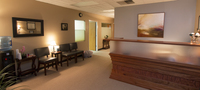 Gallery Photo of Clinic waiting room and reception desk.