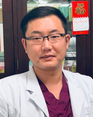Photo of Wenlong Li, Acupuncturist [IN_LOCATION]