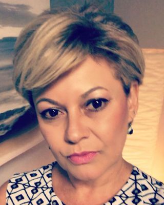 Photo of Eli Cristina Songer, Massage Therapist, LMT