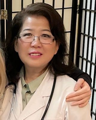 Photo of Mindy Ming Huang, L, Ac, DiplAc, OMD, Acupuncturist