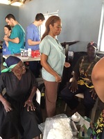 Gallery Photo of Dr. Edwards providing naturopathic care and Acupuncture in the Dominican Republic
