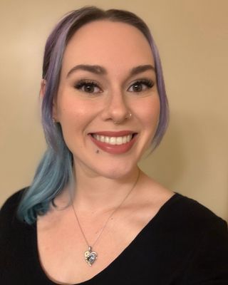 Photo of Dr. Kayla Christensen, Acupuncturist, DAcCHM, DiplAc, LAc